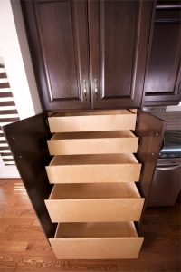 We replaced the traditional cupboard shelves with these pull-out pantry drawers, making it way easier to quickly find and access whatever it is you're looking for.